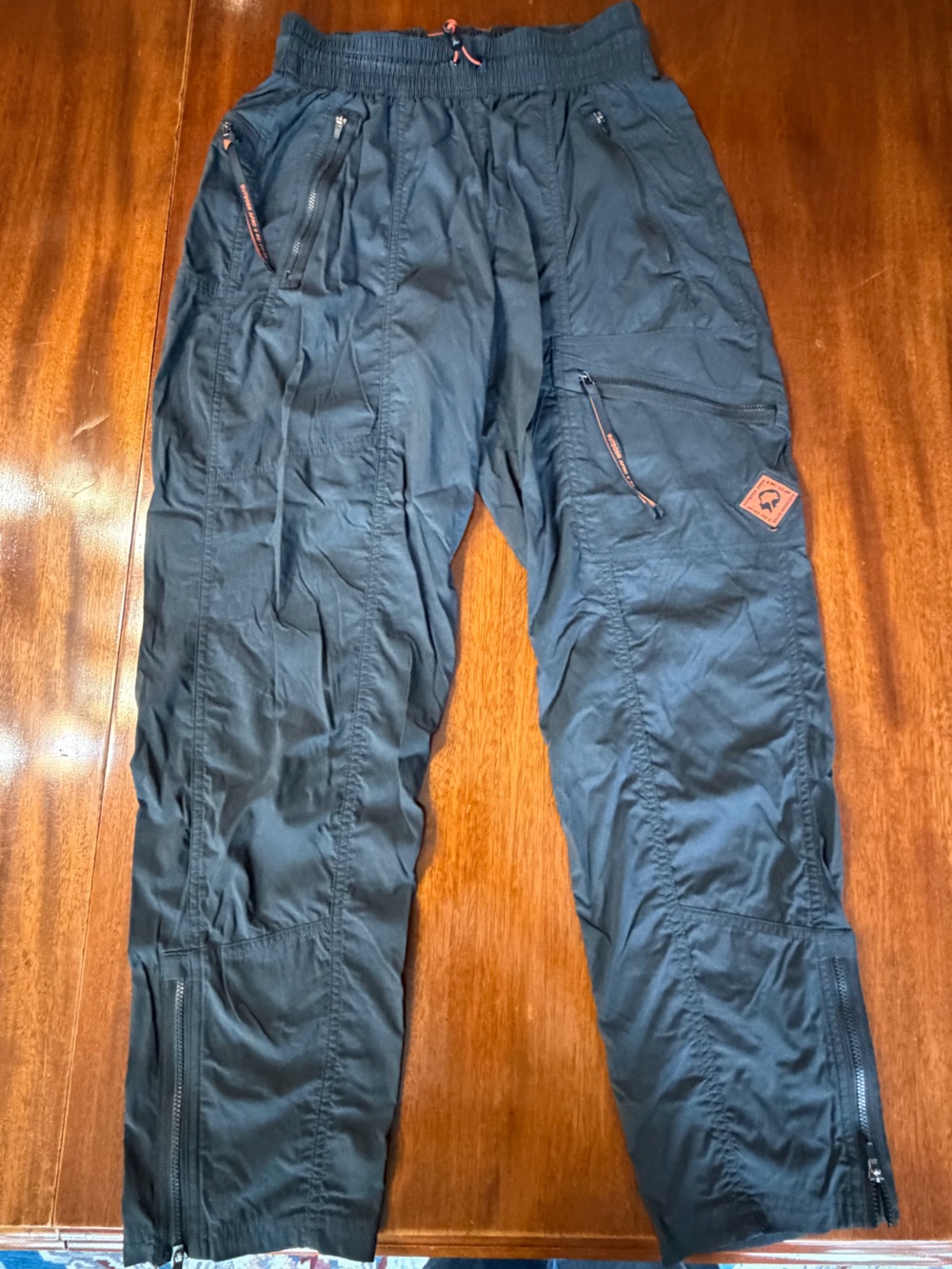 REI Black Women's Hiking Pants with Orange Accent